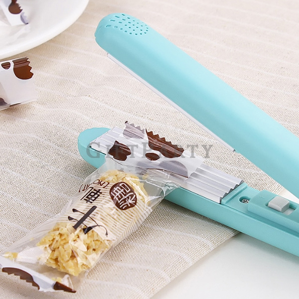 Hand pressure sealing machine,股東會贈品,股東會紀念品,超市贈品,手壓式迷你零食封口機2